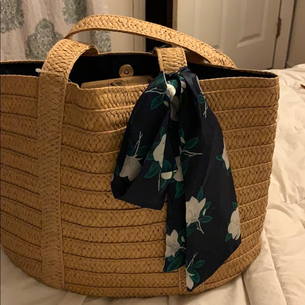 Straw bag with floral scarf
